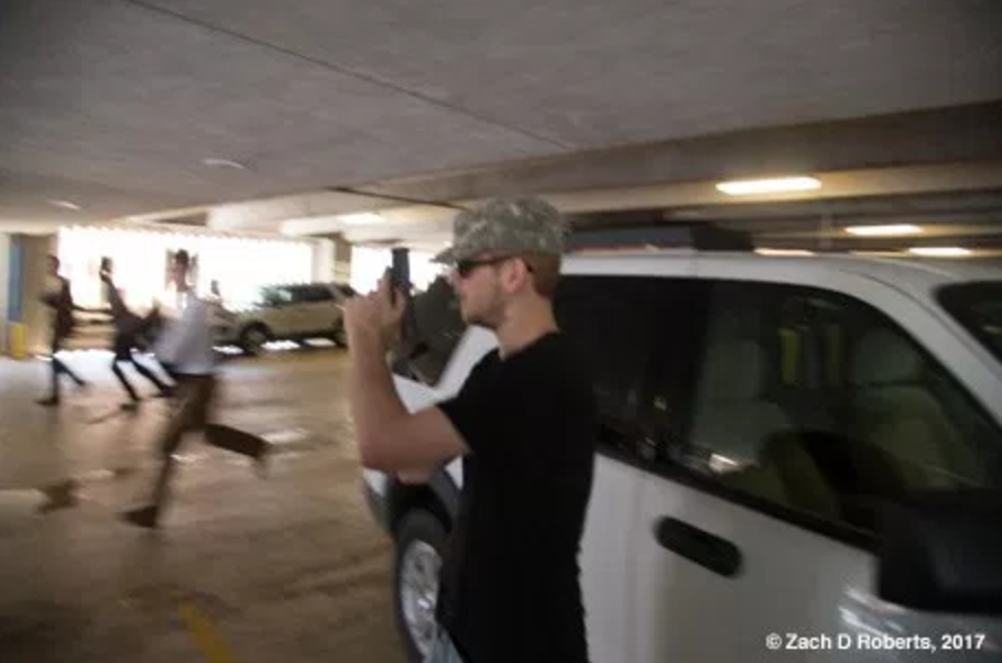 This unidentified White nationalist​ was captured with his gun out ready to shoot people as Deandre Harris​ was being assaulted.