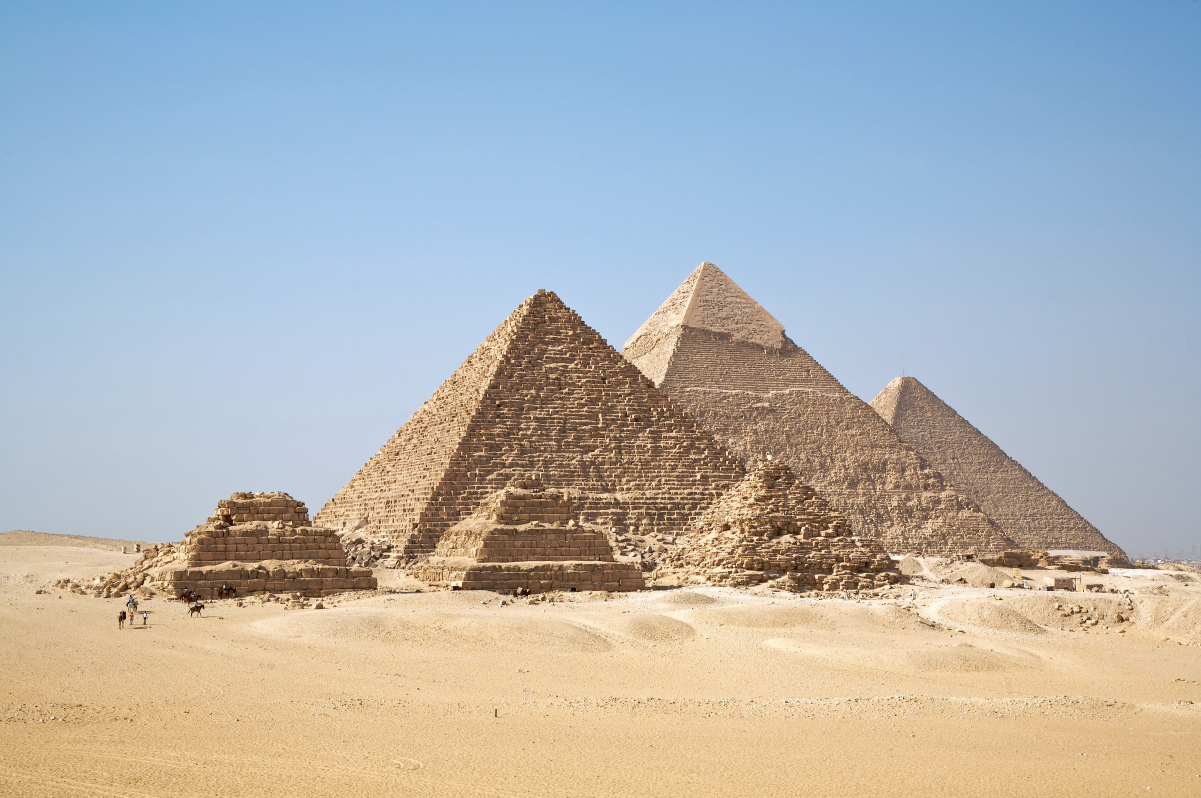 The <a href="/content/Giza_pyramid_complex" style="color:blue">pyramids of Giza</a> are among the most recognizable symbols of the civilization of ancient Egypt.