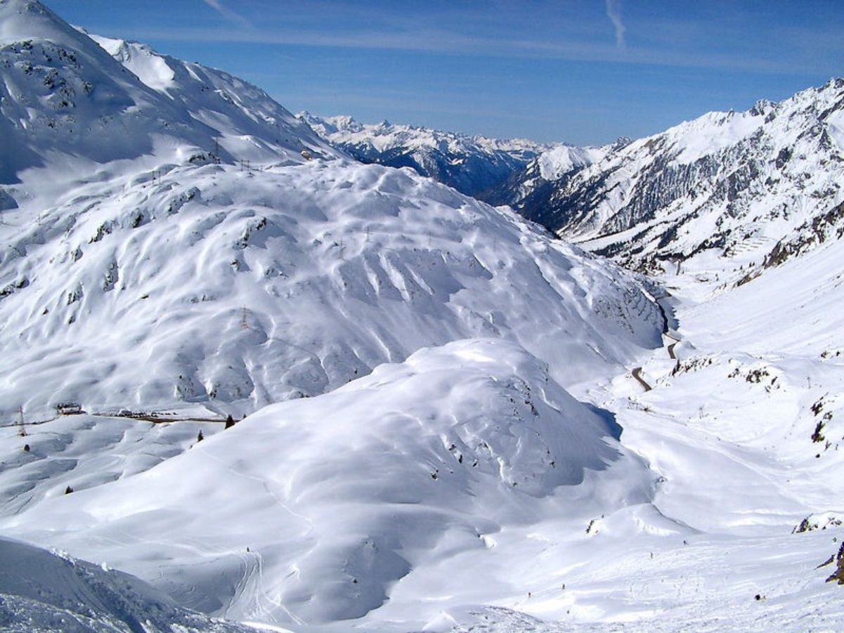 View over the Arlberg and the pass road in winter