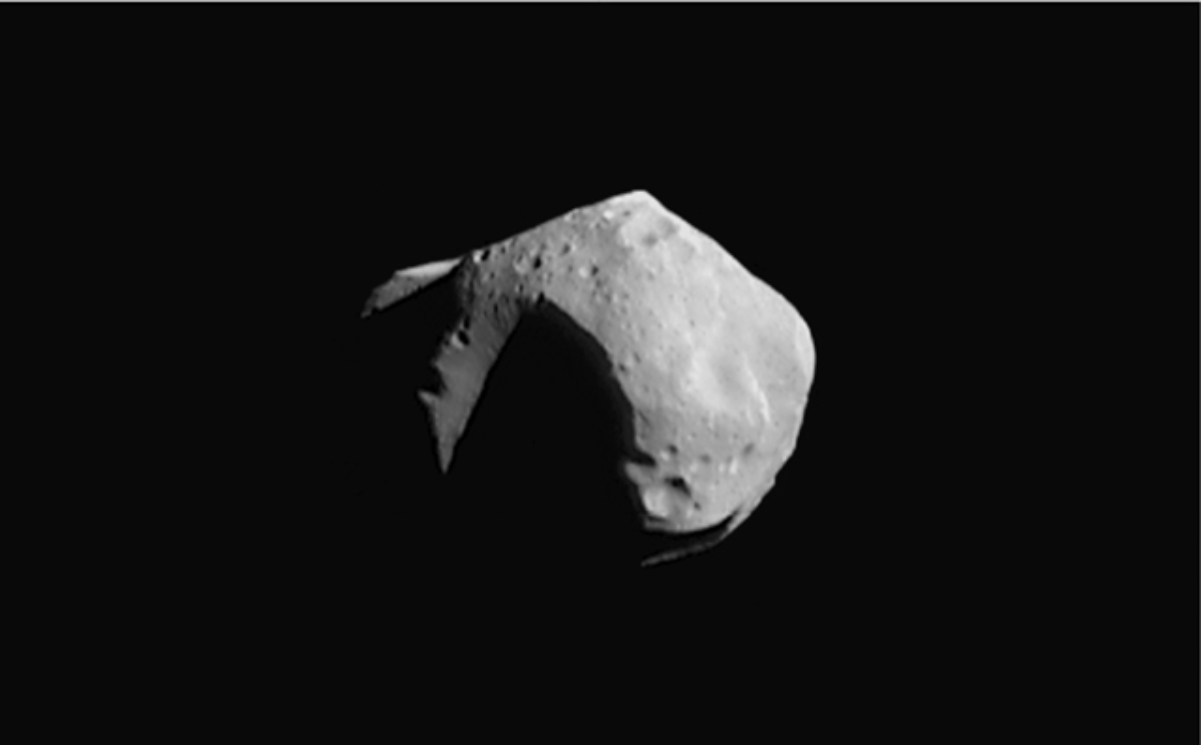 <a href="/content/253_Mathilde" style="color:blue">253 Mathilde</a>, a <a href="/content/C-type_asteroid" style="color:blue">C-type asteroid</a> measuring about 50 km (30 mi) across, covered in craters half that size. Photograph taken in 1997 by the <i><a href="/content/NEAR_Shoemaker" style="color:blue">NEAR Shoemaker</a></i> probe.