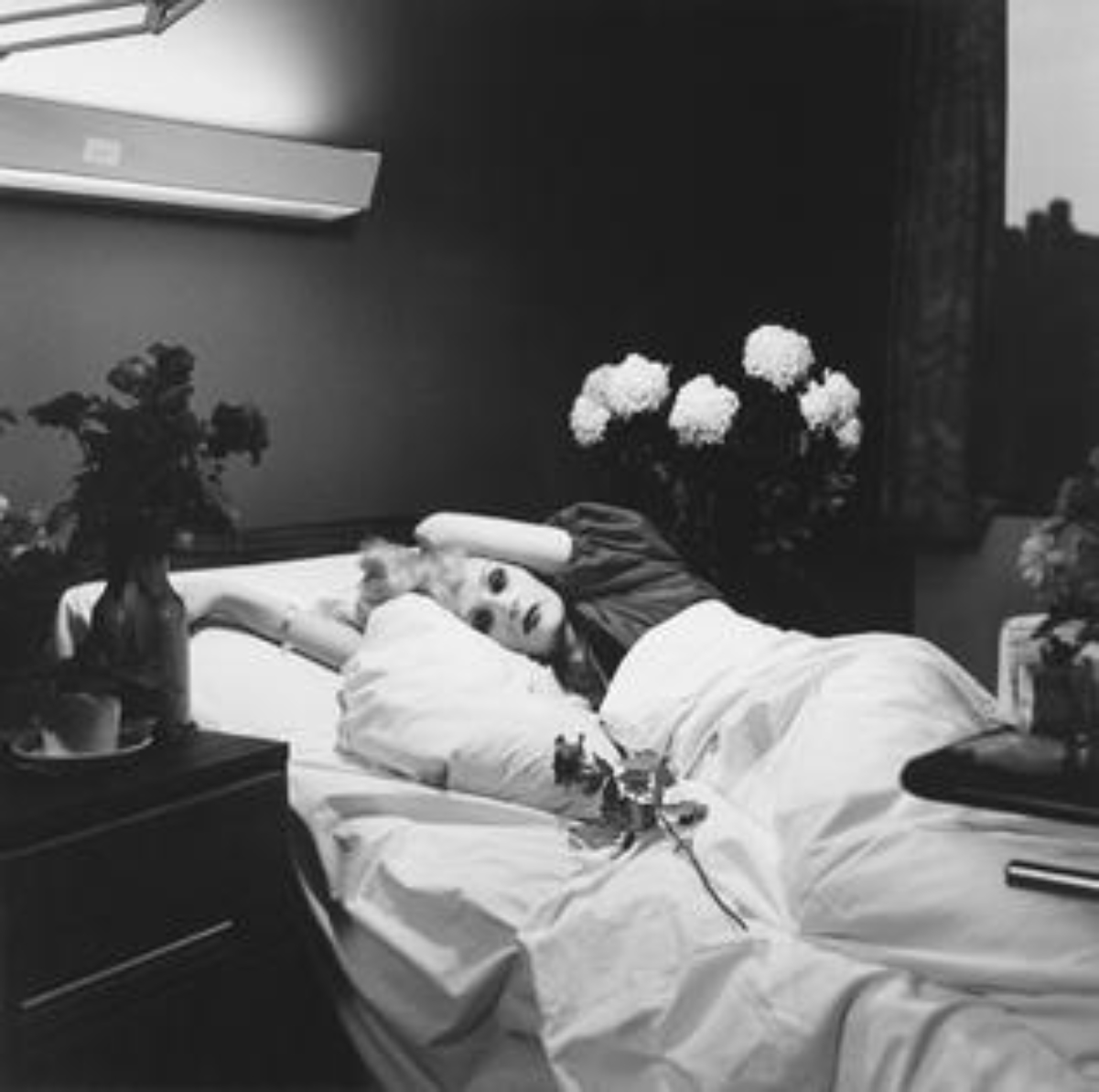 "Candy Darling on her Deathbed" by <a href="/content/Peter_Hujar" style="color:blue">Peter Hujar</a>