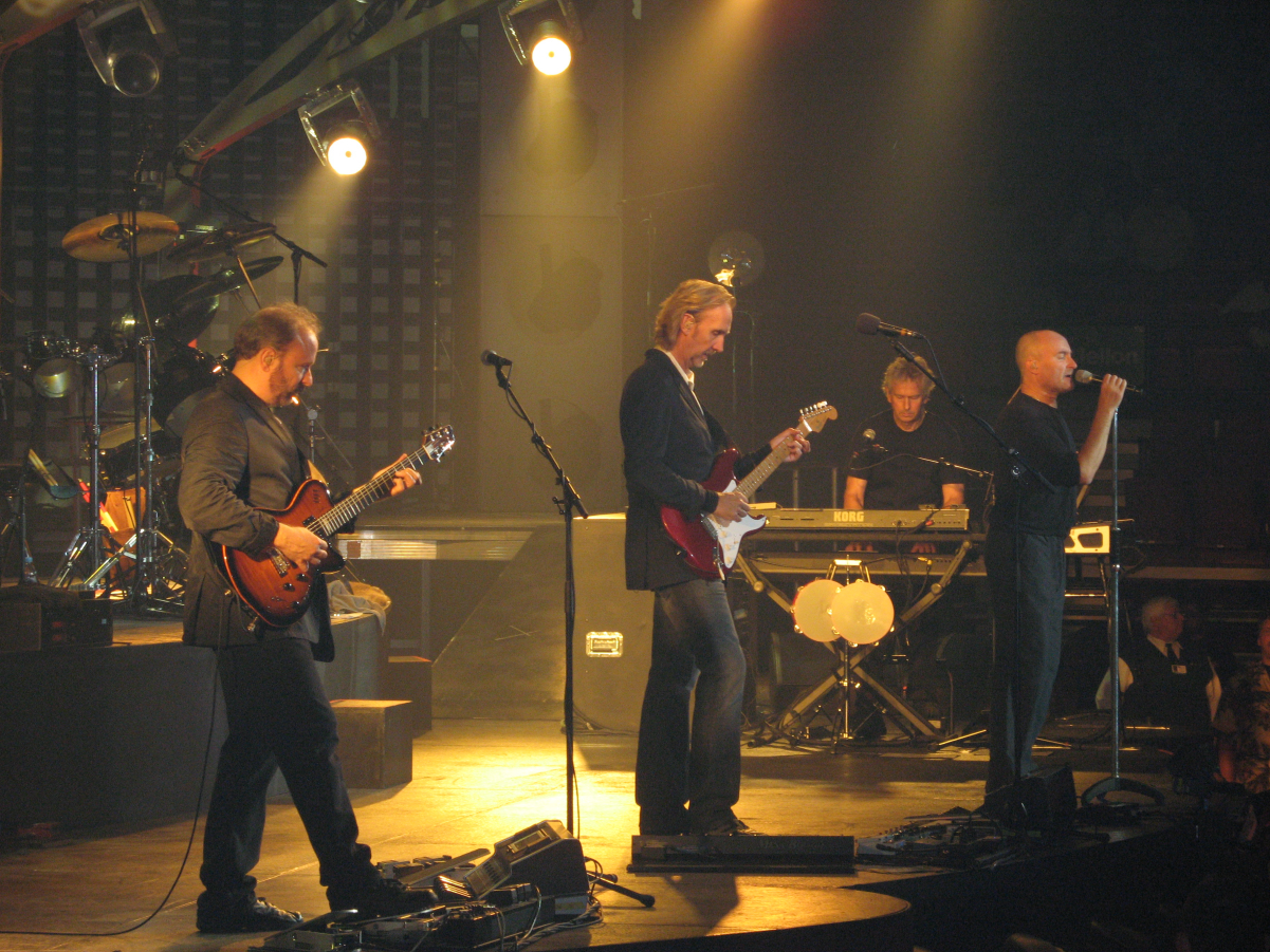 Genesis performing in 2007Left to right: <a href="/content/Daryl_Stuermer" style="color:blue">Daryl Stuermer</a>, <a href="/content/Mike_Rutherford" style="color:blue">Mike Rutherford</a>, <a href="/content/Tony_Banks_(musician)" style="color:blue">Tony Banks</a>, <a href="/content/Phil_Collins" style="color:blue">Phil Collins</a>