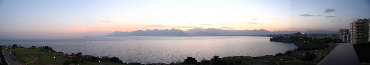 Looking west towards
<a href="/content/Kemer" style="color:blue">Kemer</a> and the <a href="/content/Taurus_mountains" style="color:blue">Taurus mountains</a> on the Gulf of Antalya from <a href="/content/Antalya" style="color:blue">Antalya</a> city