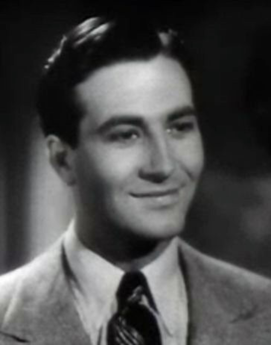 Lynn in the <i><a href="/content/Four_Daughters" style="color:blue">Four Daughters</a></i> (1938)