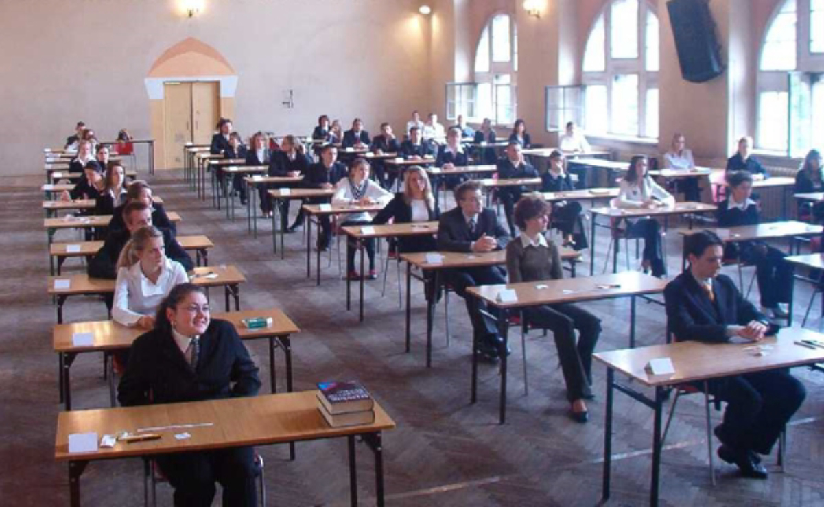 High-school pupils in <a href="/content/Szczecin" style="color:blue">Szczecin</a>, Poland, waiting to write a <i>matura</i> exam in 2005