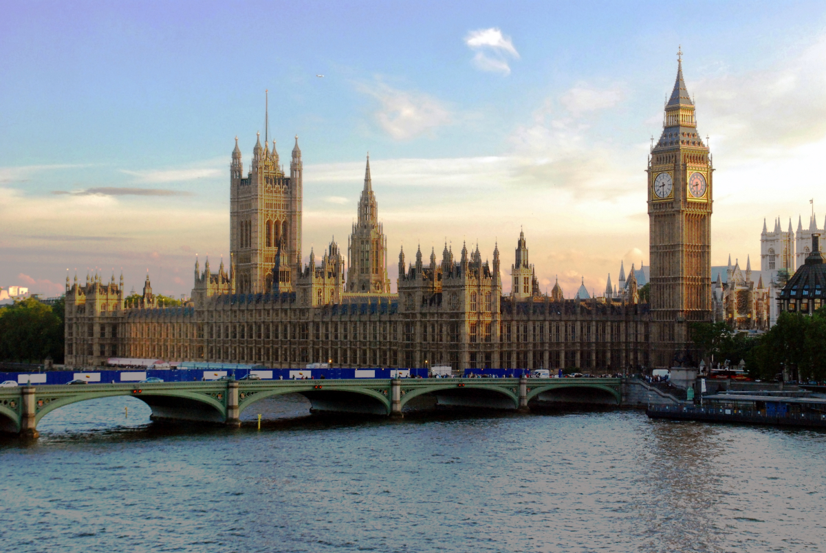 Seen from across the <a href="/content/River_Thames" style="color:blue">River Thames</a> with <a href="/content/Westminster_Bridge" style="color:blue">Westminster Bridge</a> in the foreground