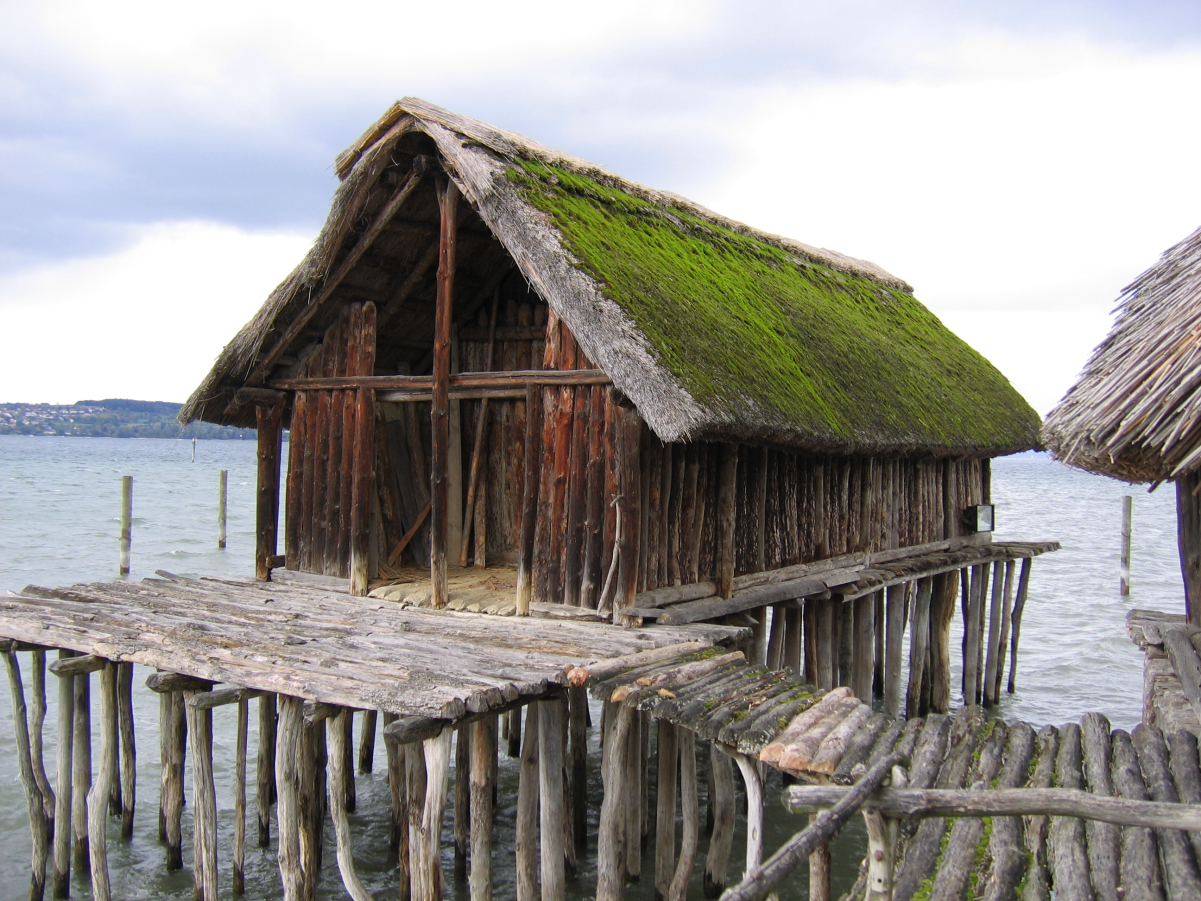 Reconstruction of a pile house at the <a href="/content/Pfahlbaumuseum_Unteruhldingen" style="color:blue">Pfahlbau Museum Unteruhldingen</a> on <a href="/content/Lake_Constance" style="color:blue">Lake Constance</a> in Germany