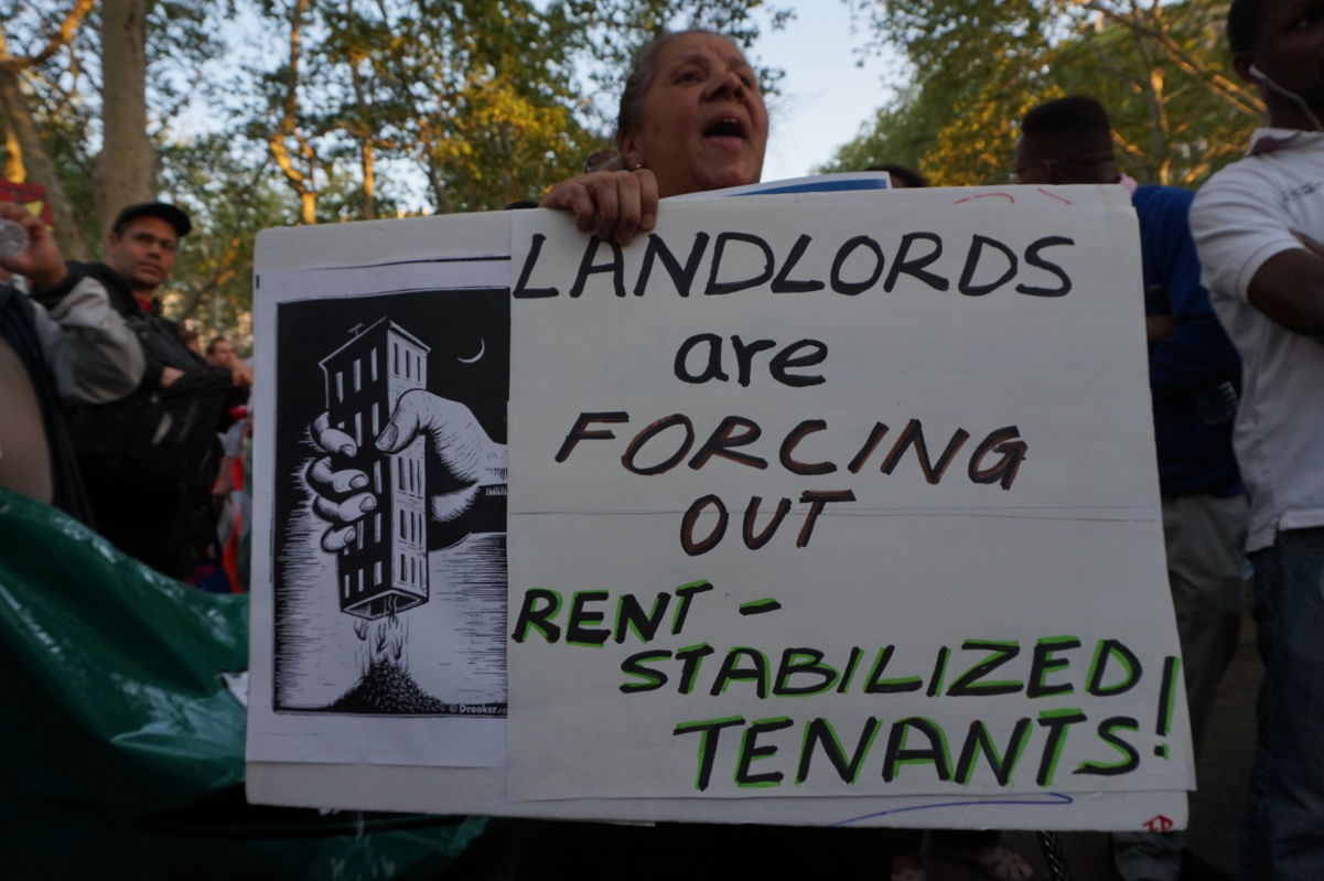Protest sign at a rally for <a href="/content/Landlord%E2%80%93tenant_law" style="color:blue">tenants rights</a> in New York City