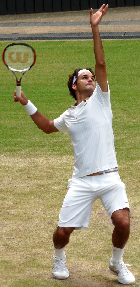 Roger Federer serving in the <a href="/content/2009_Wimbledon" style="color:blue">2009 Wimbledon</a> final
