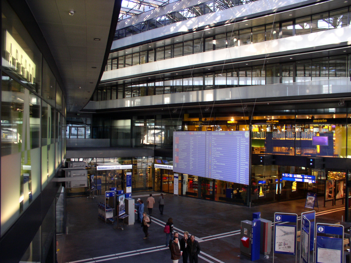 The <a href="/content/Split-flap_display" style="color:blue">split-flap</a> <a href="/content/Passenger_information_system" style="color:blue">information board</a> at <a href="/content/Zug_railway_station" style="color:blue">Zug</a> includes details of S9 services.