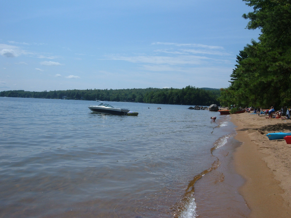 A beach in <a href="/content/Sebago_Lake_State_Park" style="color:blue">Sebago Lake State Park</a>