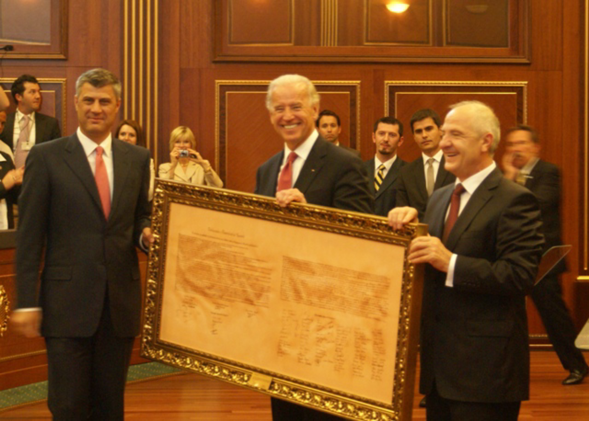U.S. Vice President <a href="/content/Joe_Biden" style="color:blue">Joe Biden</a> and <a href="/content/Hashim_Tha%C3%A7i" style="color:blue">Hashim Thaçi</a> with Declaration of Independence of <a href="/content/Kosovo" style="color:blue">Kosovo</a>
