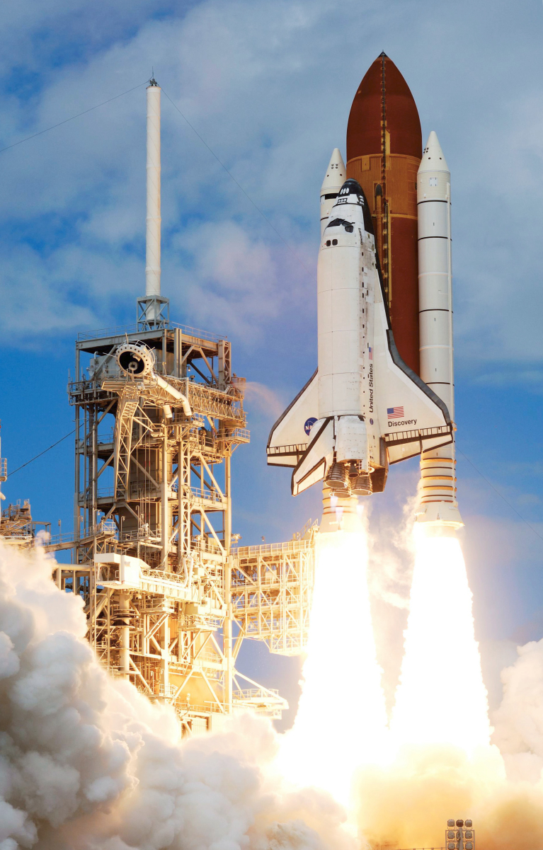 <i><a href="/content/Space_Shuttle_Discovery" style="color:blue">Discovery</a></i> lifts off at the start of <a href="/content/STS-120" style="color:blue">STS-120</a>.