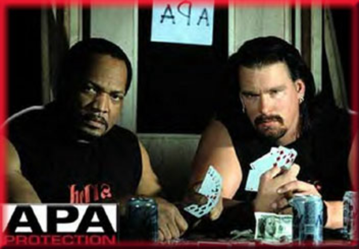 <a href="/content/Ron_Simmons" style="color:blue">Faarooq</a> (left) and <a href="/content/John_Layfield" style="color:blue">Bradshaw</a>