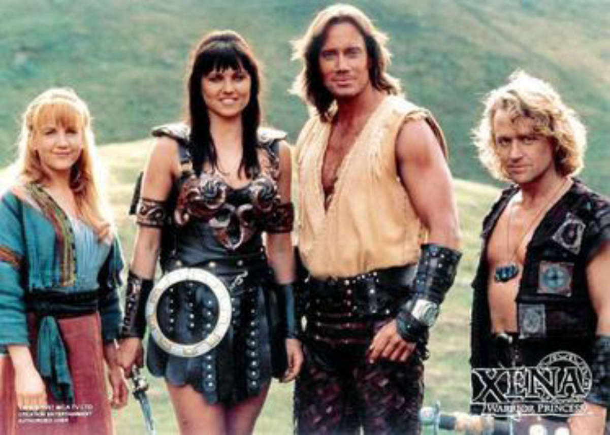 Main characters: (left to right) <a href="/content/Gabrielle_(Xena)" style="color:blue">Gabrielle</a>, <a href="/content/Xena" style="color:blue">Xena</a>, <a href="/content/Hercules" style="color:blue">Hercules</a> and <a href="/content/Iolaus" style="color:blue">Iolaus</a>